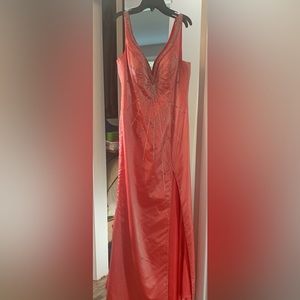 New coral dress with side slit. Never been worn. Size 12. Length 62”.